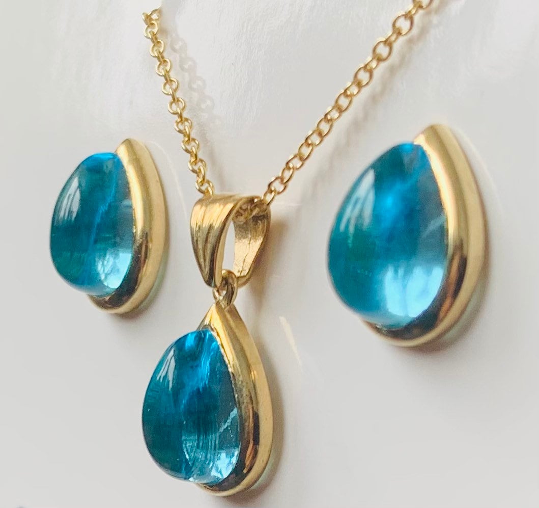 Aretes de topacio cabujón en forma de pera de oro amarillo macizo de 9 k