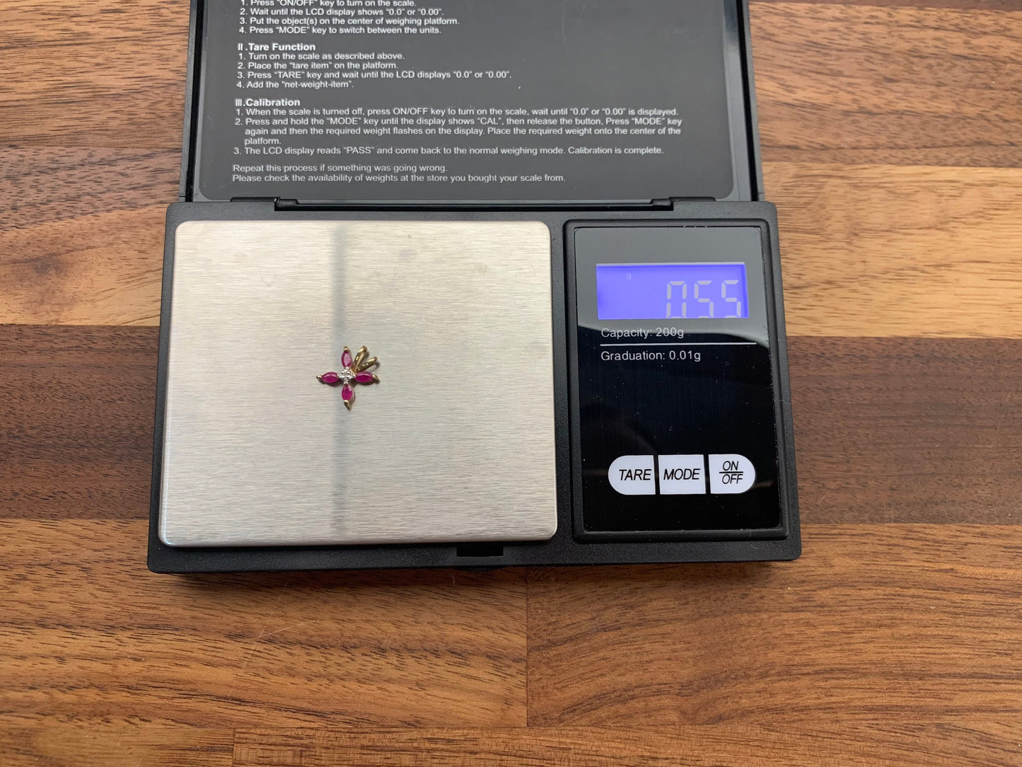 Colgante vintage de oro de 9 ct con rubí y diamantes de 0,52 ct