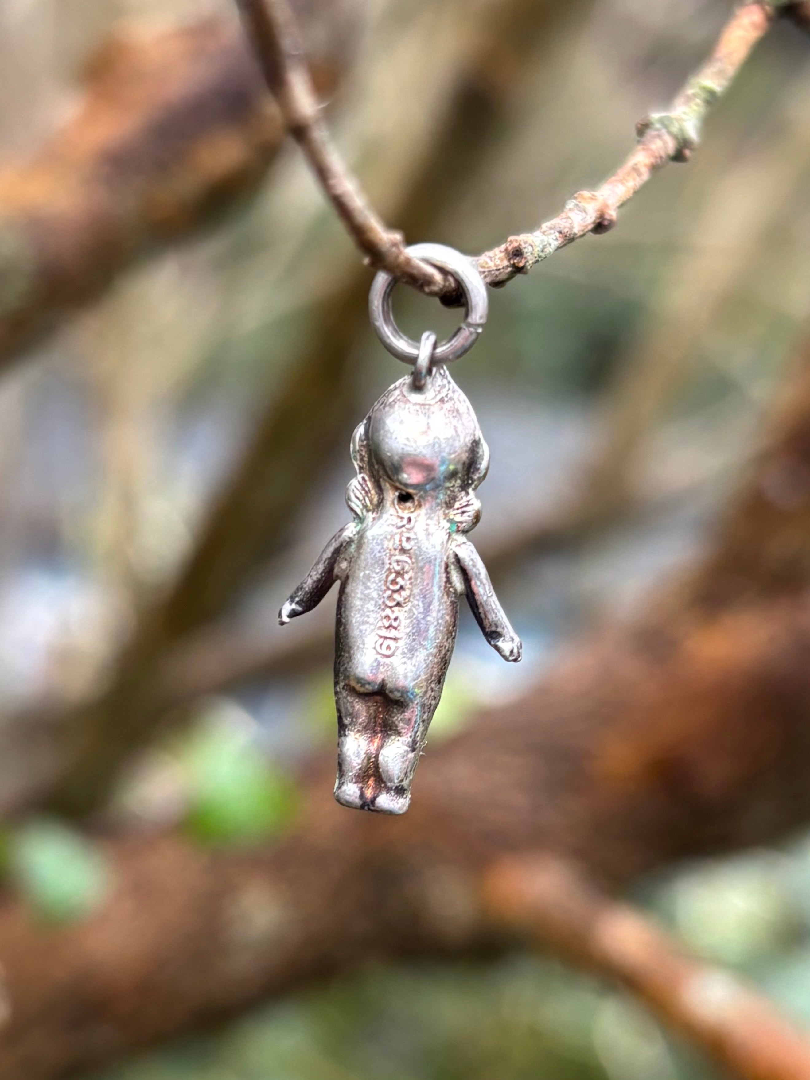 Antique Kewpie Fumsup Silver Charms