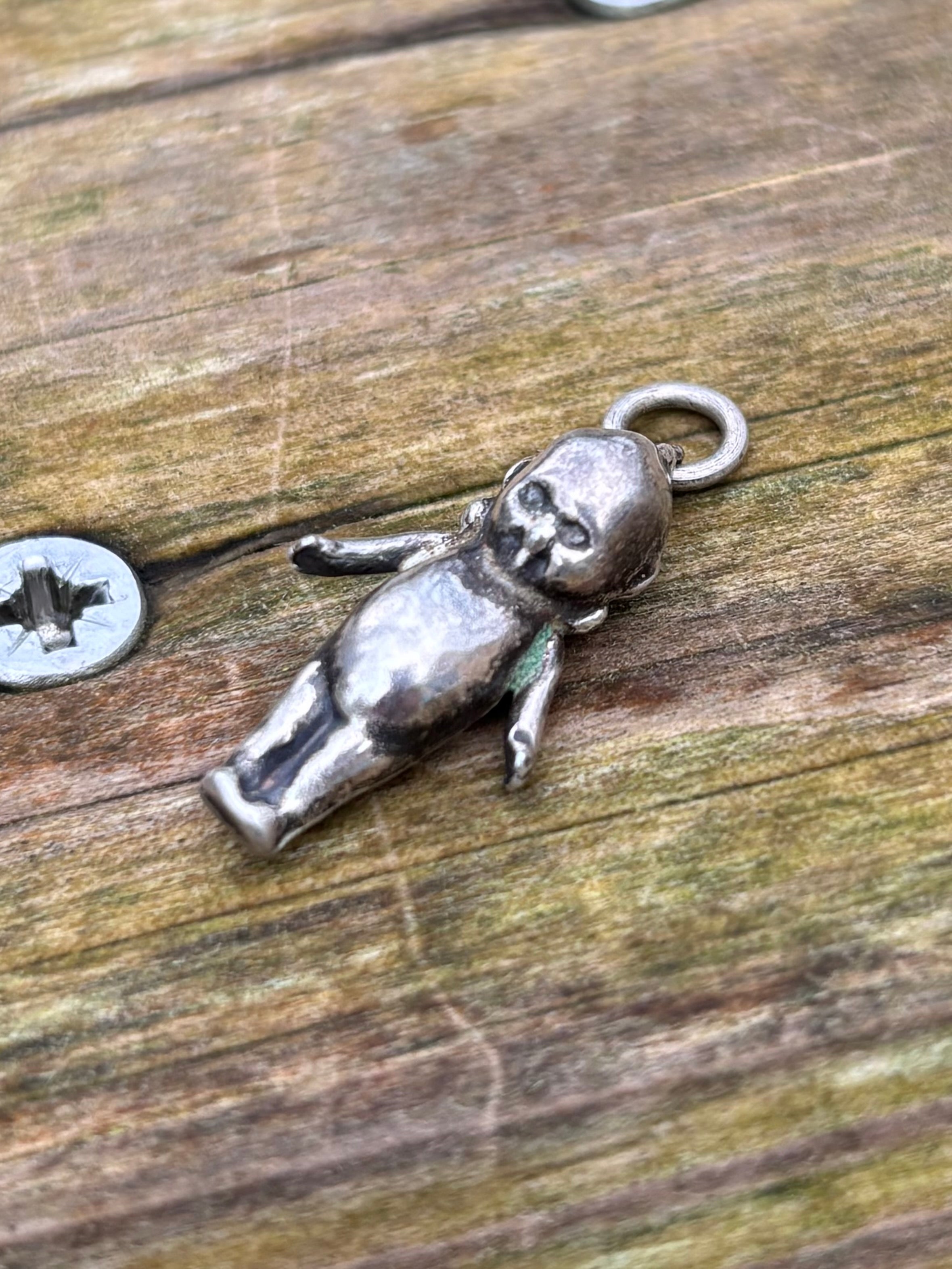 Antique Kewpie Fumsup Silver Charms