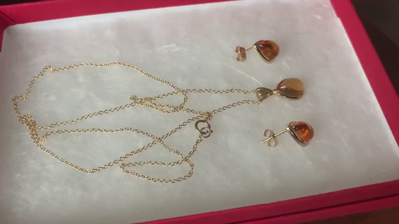 Aretes de citrino cabujón en forma de pera de oro amarillo macizo de 9 k