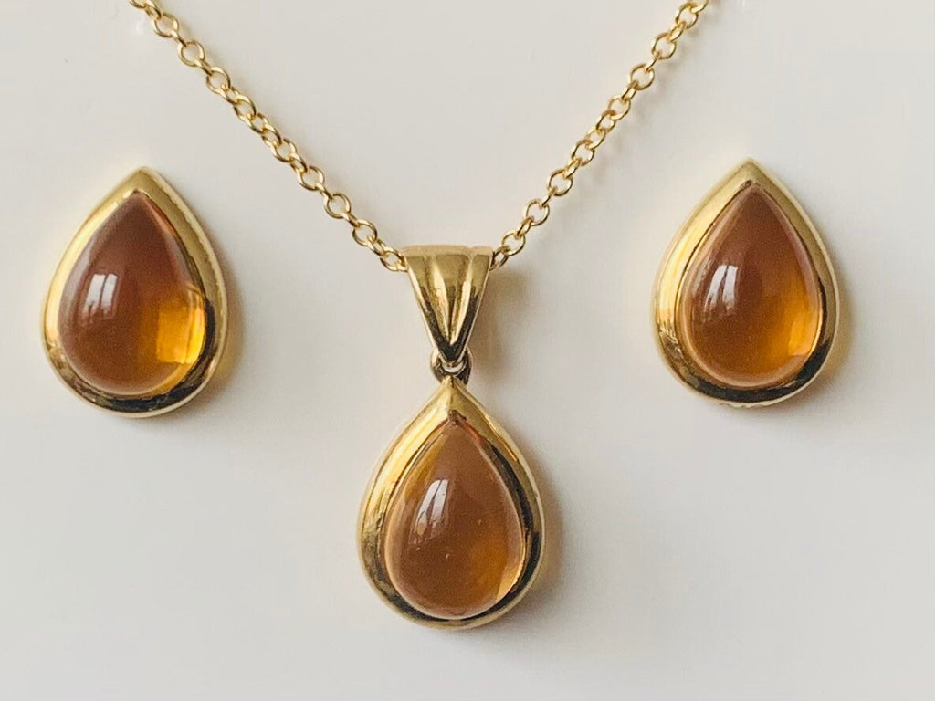 Aretes de citrino cabujón en forma de pera de oro amarillo macizo de 9 k